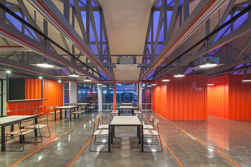 URBANTAINER extends the national theater company of korea with modulated red shipping containers