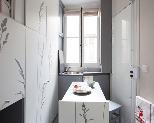 kitoko studio fills tiny 8 sqm parisian apartment with hidden amenities