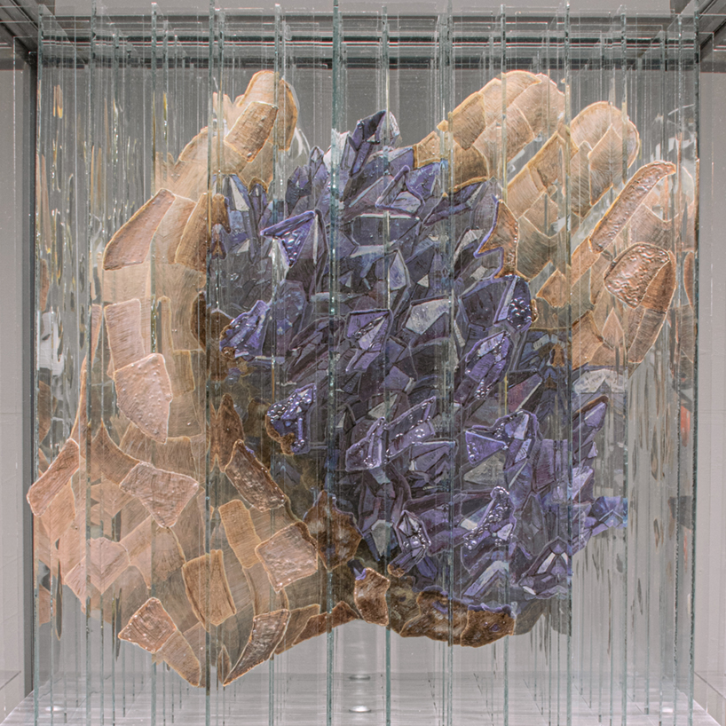 anamorphic installation by thomas medicus&nbsp;rotates into four shifting hand images - 2