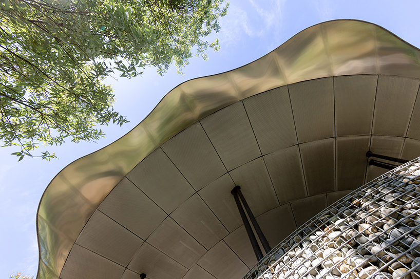 lotus garden a waterside ecological cycling station with metal lotus leaves floating in dapo pond taiwan 3
