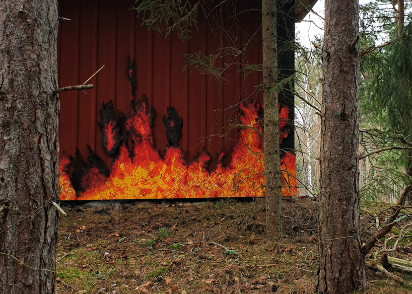 UMA installs a spectacular fire-like lighting system in a swedish forest