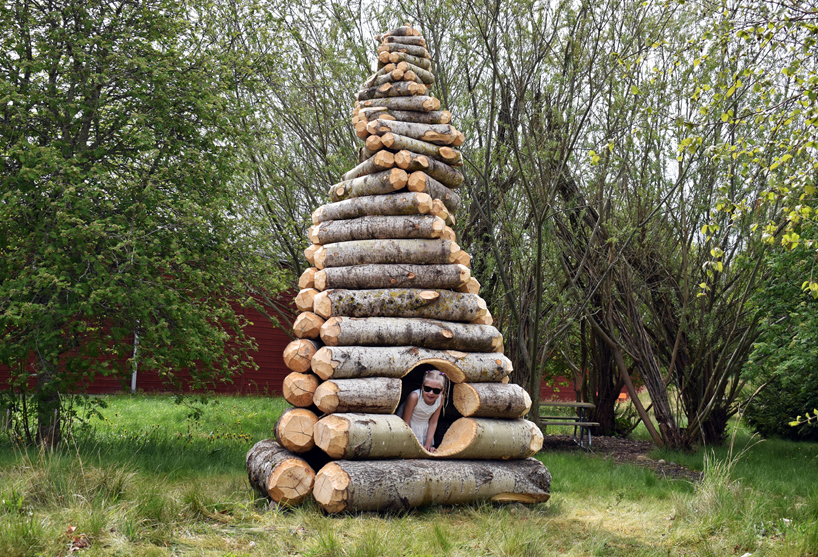 timber twist by ulf mejergren and travis child reimagines larvae shelter as spiraling log cabin