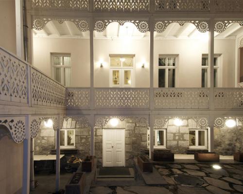 belgin koz transforms 120-year-old residence into boutique hotel