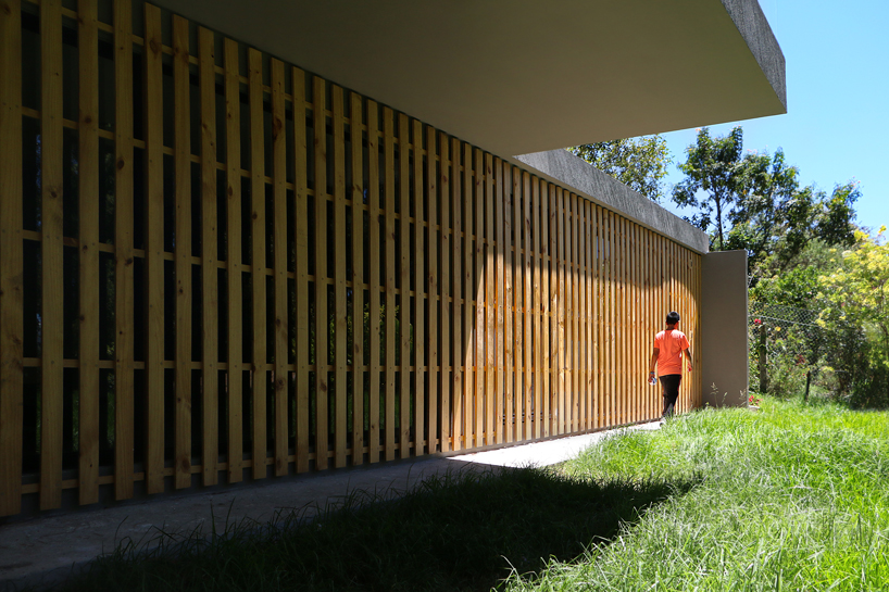 ruptura morlaca's concrete house floats weightlessly over serene landscape in ecuador