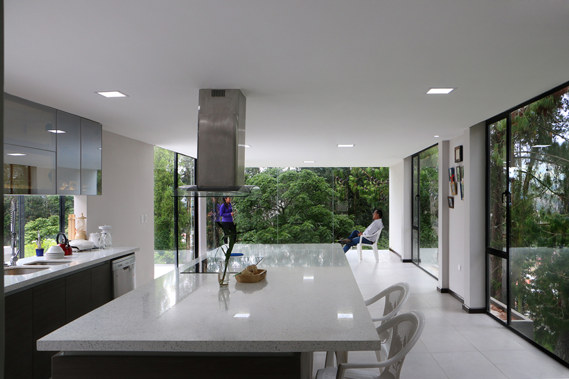 ruptura morlaca's concrete house floats weightlessly over serene landscape in ecuador