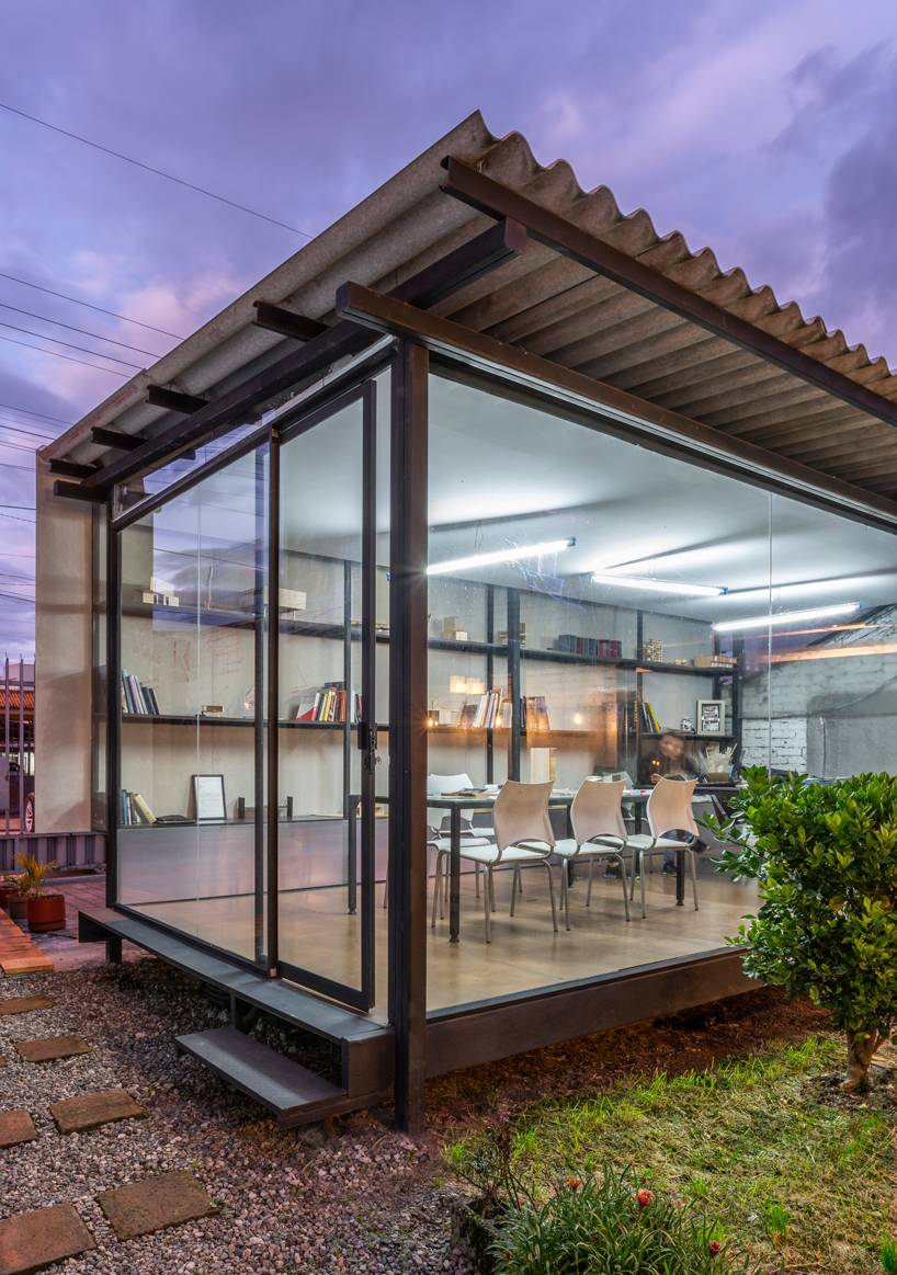 ruptura morlaca plans a glazed workshop around a central courtyard in ecuador designboom