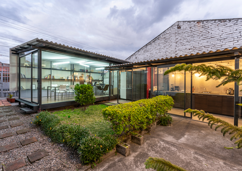 ruptura morlaca plans a glazed workshop around a central courtyard in ecuador designboom