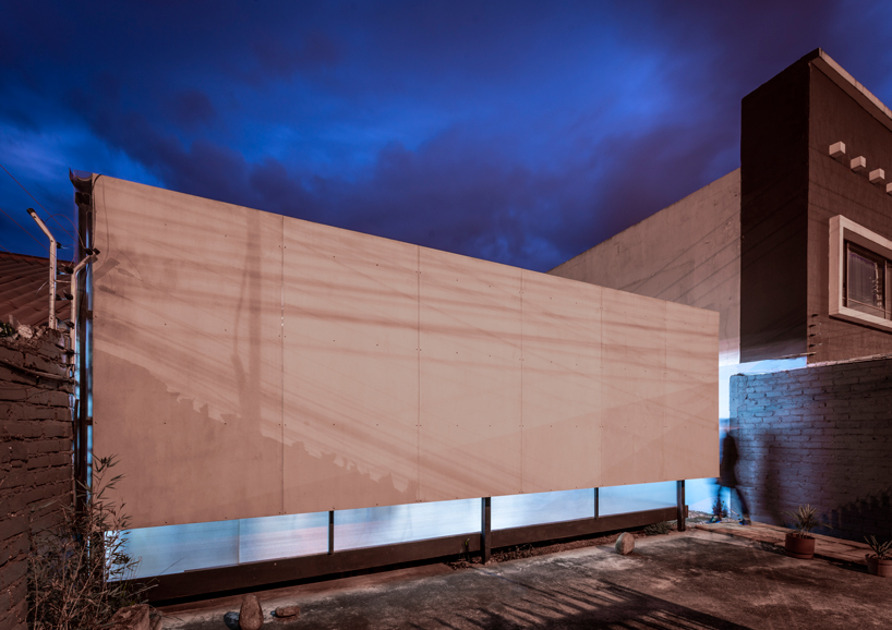 ruptura morlaca plans a glazed workshop around a central courtyard in ecuador designboom