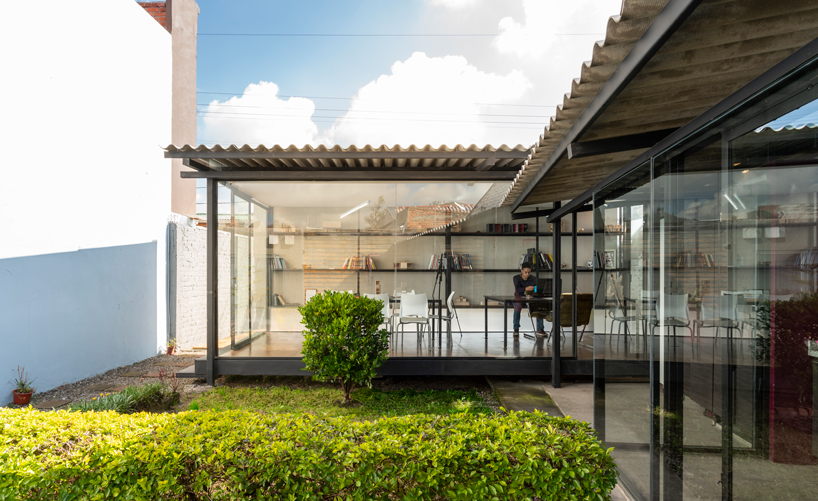 ruptura morlaca plans a glazed workshop around a central courtyard in ecuador designboom