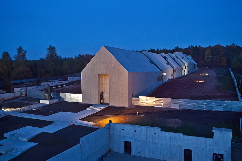 nizio design international's mausoleum of the martyrdom of polish villages