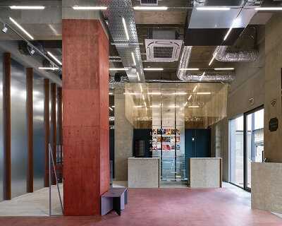 tato architects turns a former bank into a reflective cinema in kyoto