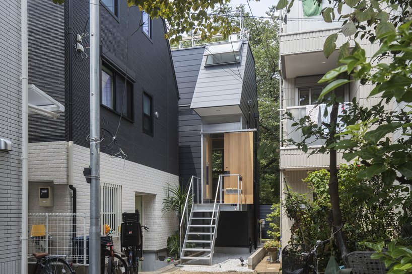 a spiral of timber beams and steel frames tiny 40-sqm tokyo home