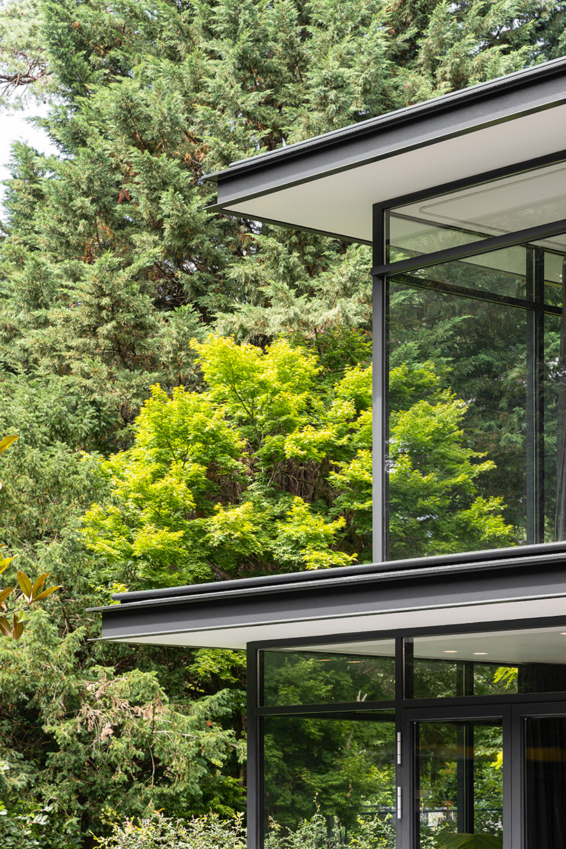 red brick facade and steel fascias form villa trompenberg in the netherlands