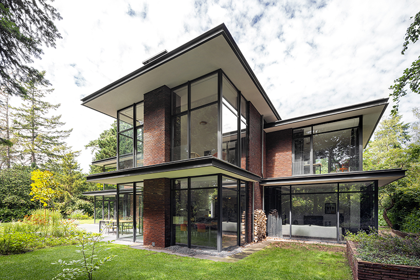 red brick facade and steel fascias form villa trompenberg in the netherlands