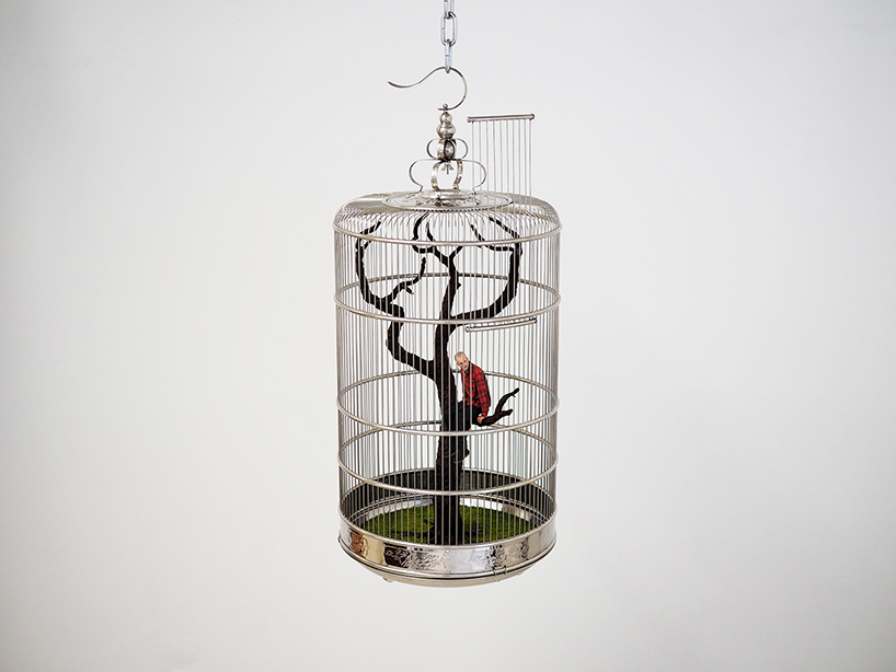 benjamin nordsmark imprisons 3D printed 'mini-me' in birdcage to question contemporary ways of living