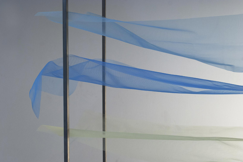mizuki odashiro fastens pieces of colored tulle in the tone shelf 