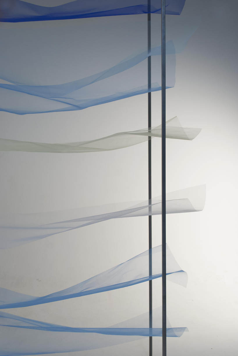 mizuki odashiro fastens pieces of colored tulle in the tone shelf 