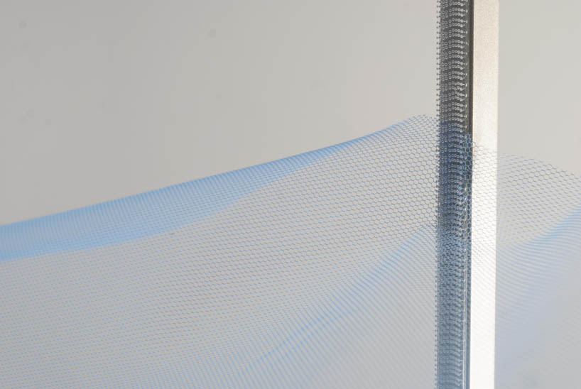 mizuki odashiro fastens pieces of colored tulle in the tone shelf 