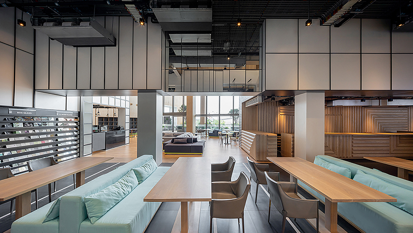 Onion's solid ash and plywood restaurant interior in Bangkok