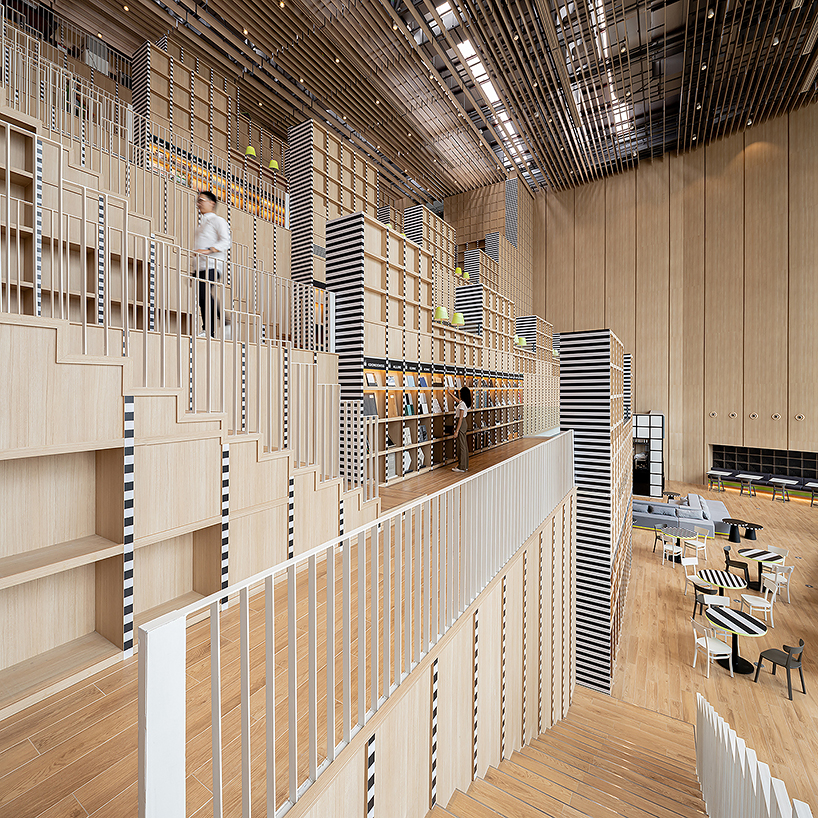 Onion's solid ash and plywood restaurant interior in Bangkok