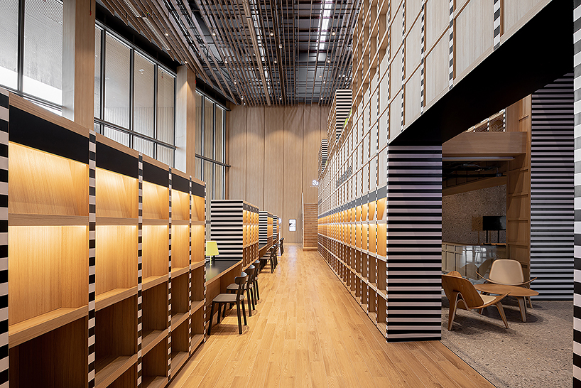 Onion's solid ash and plywood restaurant interior in Bangkok