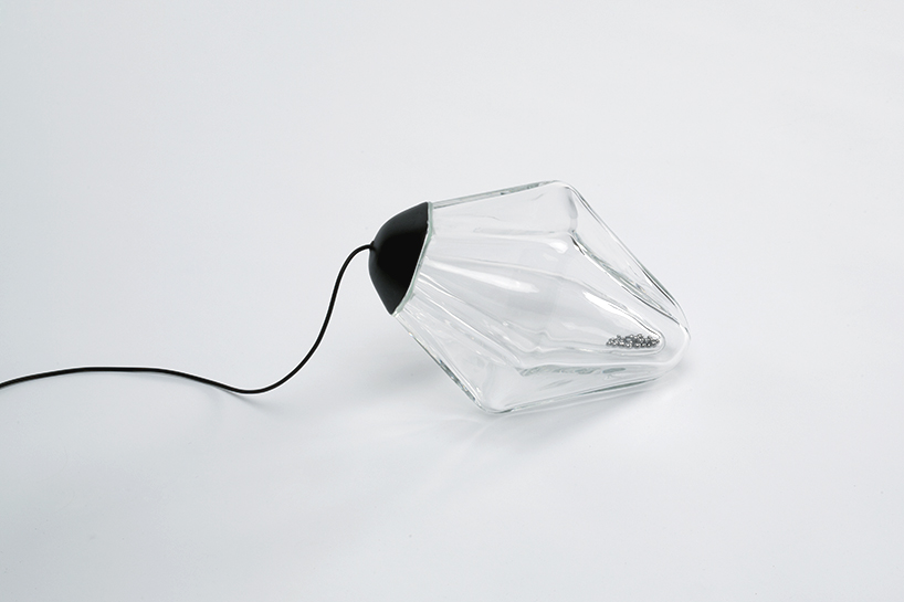 the mercure lamp by lucie le guen uses its own inclination to turn on