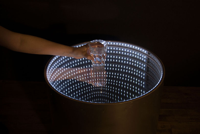 infinitum table's luminous surface encourages tidiness