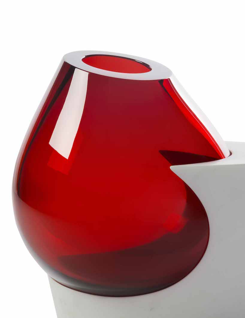 emmanuel babled fuses hand-blown glass and carrara marble with osmosi line