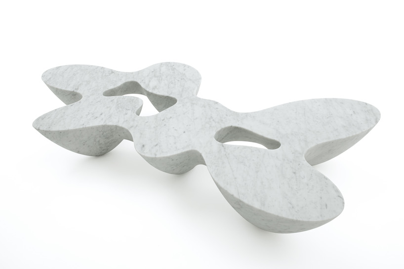 emmanuel babled fuses hand-blown glass and carrara marble with osmosi line