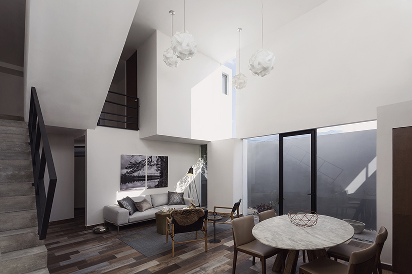 arquidromo's monolithic cloud house floats above the city of monterrey