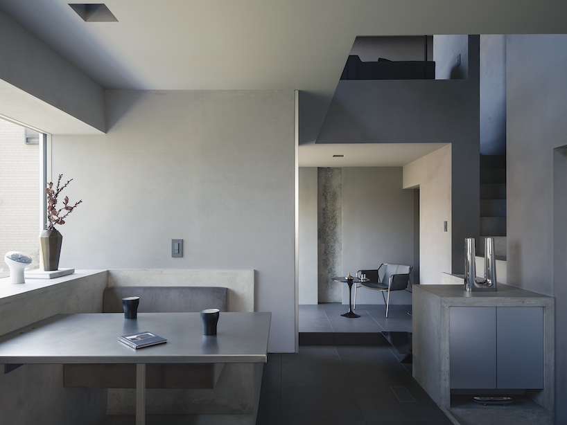 glazed passage frames lake views through this compact japanese house - 6