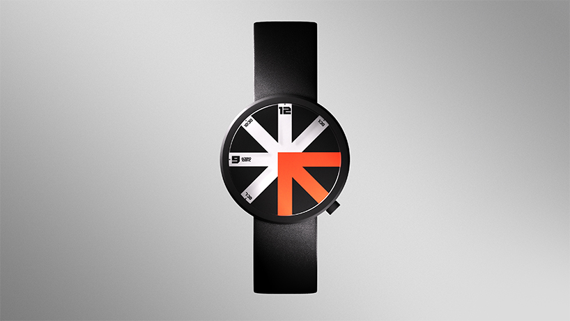 colored arrow dial rotates over eight transparent dividers in ion lucin's arrowatch