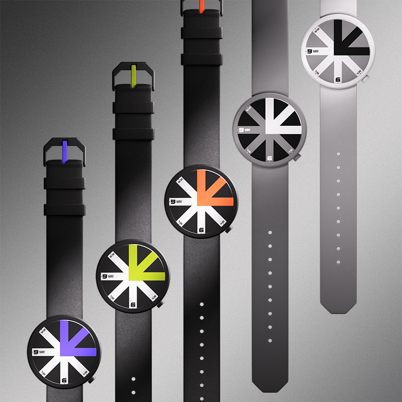 colored arrow dial rotates over eight transparent dividers in ion lucin's arrowatch