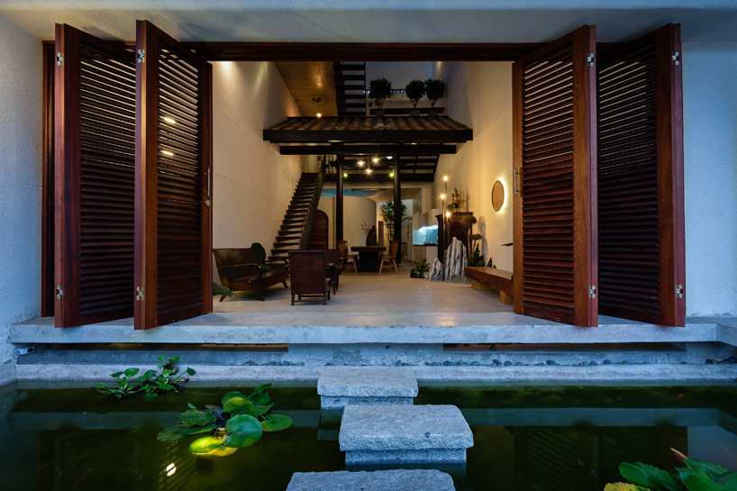 the memory house by 23o5 studio in vietnam hosts three generations under one roof