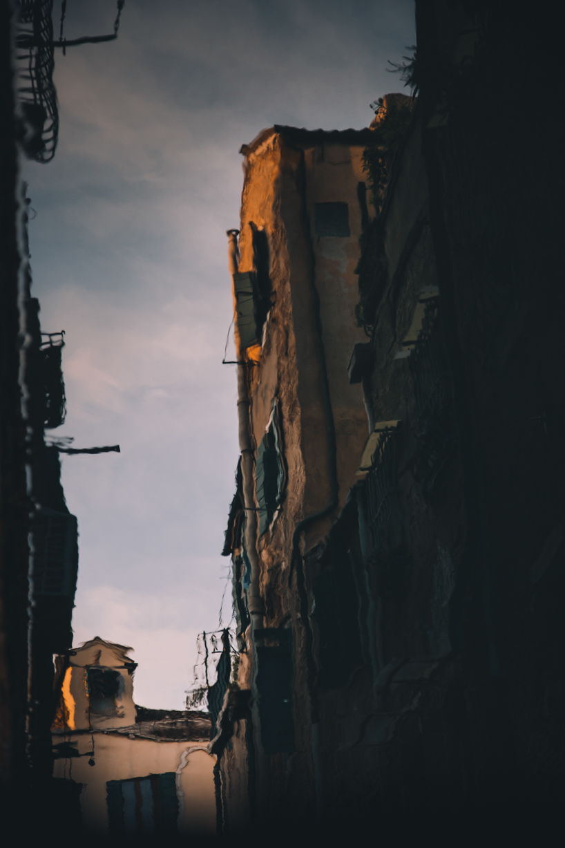 a reflected world of venice is captured in mayank thammalla's photo series designboom