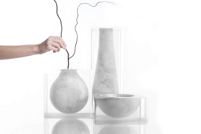 moreno ratti casts carrara marble vessels within resin blocks