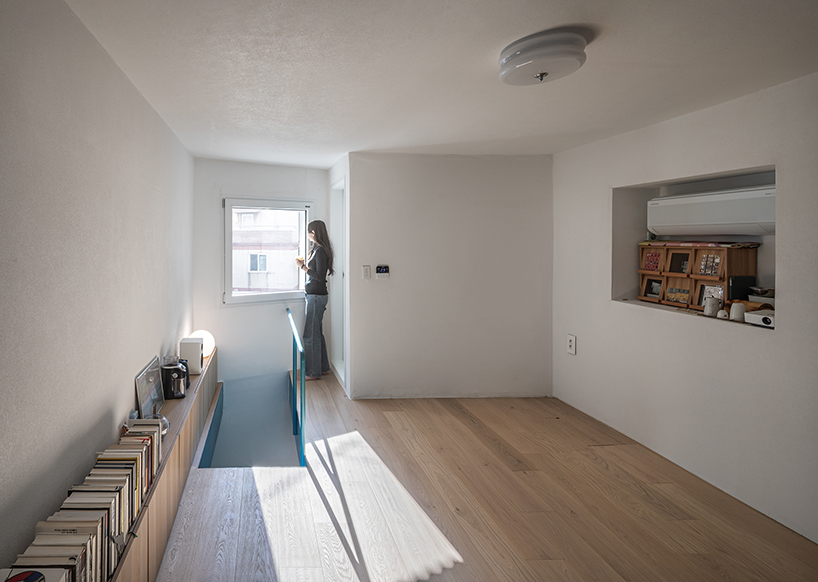 Una casa en el centro de la ciudad una persona 7