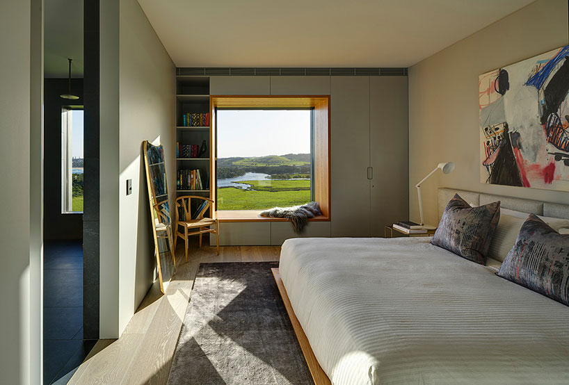 australian beach house creates farmland sanctuary from wild ocean surroundings