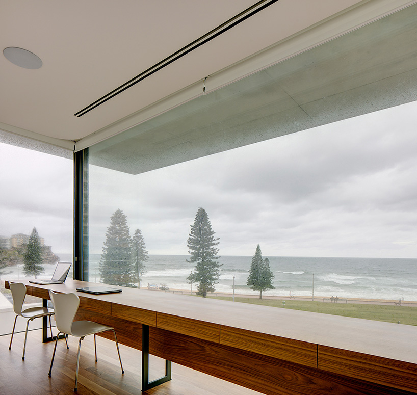 curved concrete and glass panels form residence in manly beach, australia