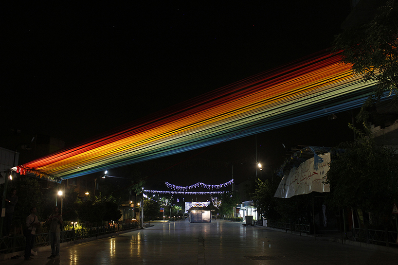 EOT design studio creates colorful, whispering rainbow in tehran
