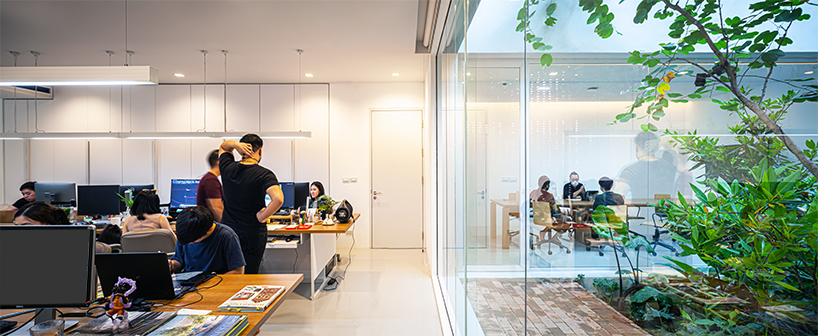 voids + solids articulate white office box in bangkok by junsekino