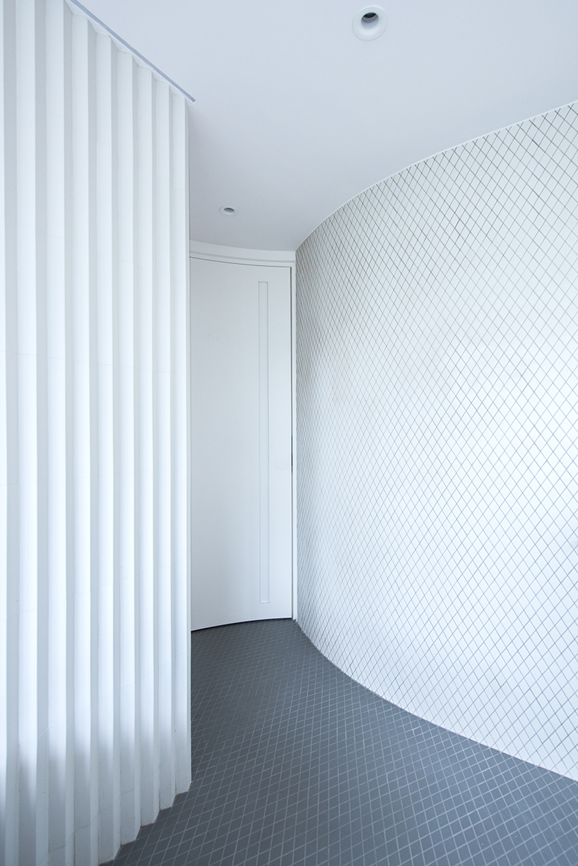 curvy volumes in bean buro's apartment renovation reference flowing water