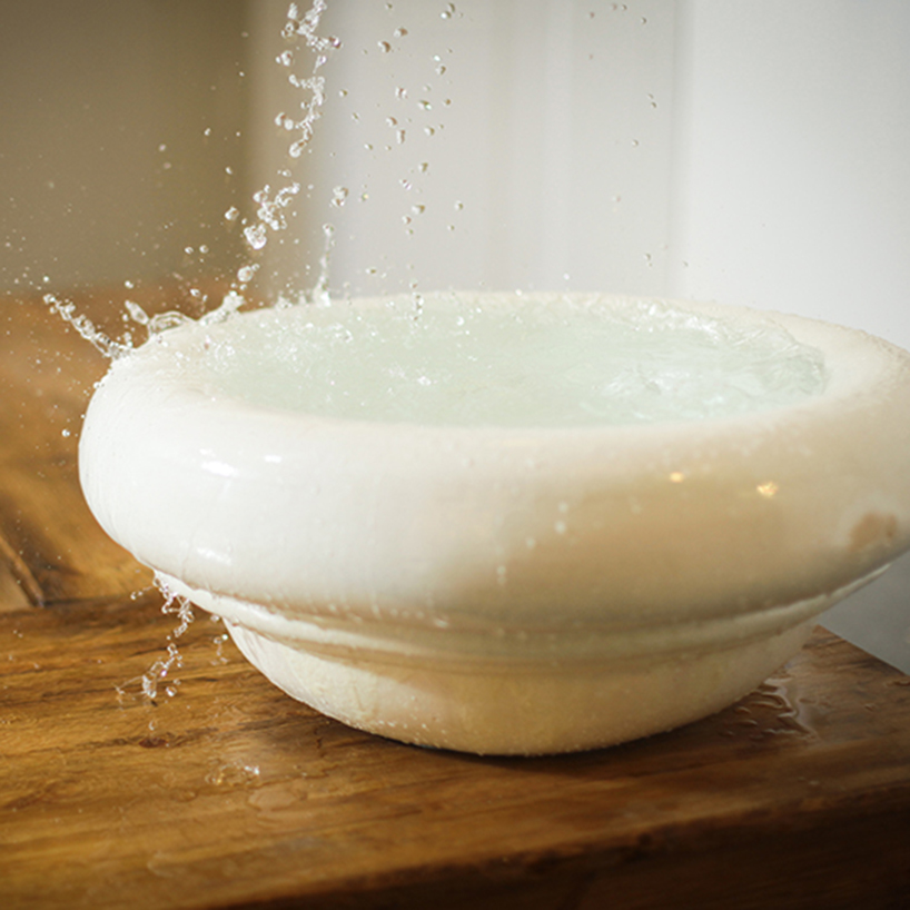 gur inbar forms minimal bathhouse with traditional israeli motifs