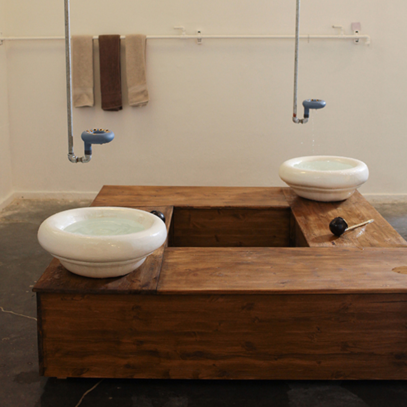 gur inbar forms minimal bathhouse with traditional israeli motifs