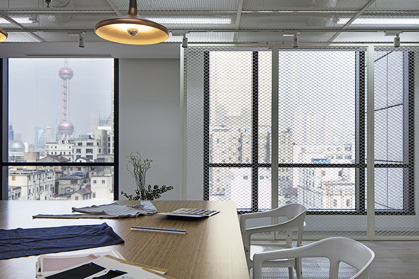 mitsuhiro shoji completes minimal studio for tredia china in shanghai