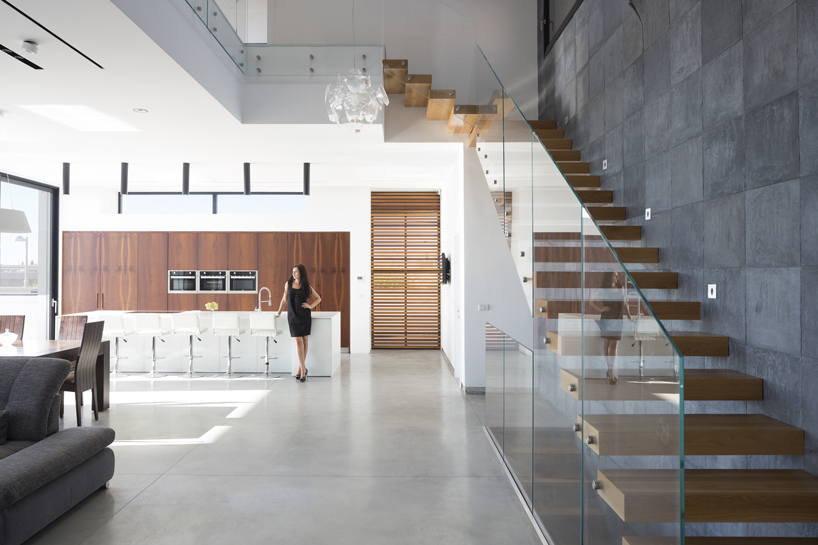 dan and hila israelevitz add round light openings to house in israel