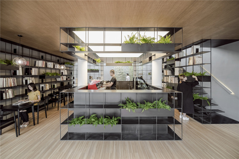 archstudio blends books, coffee and plants in beijing's bookstore