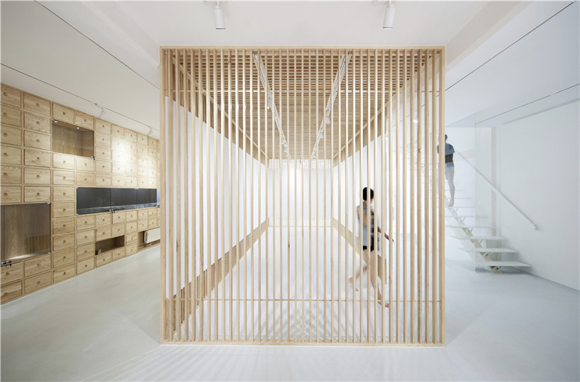 archstudio creates flexible art gallery space using folding screens in beijing