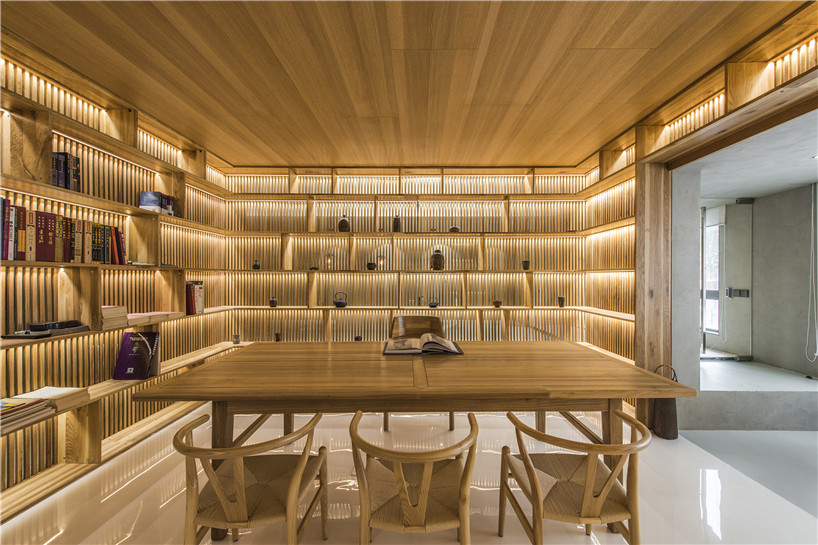 archstudio mixes materials to blend spaces in a townhouse in beijing