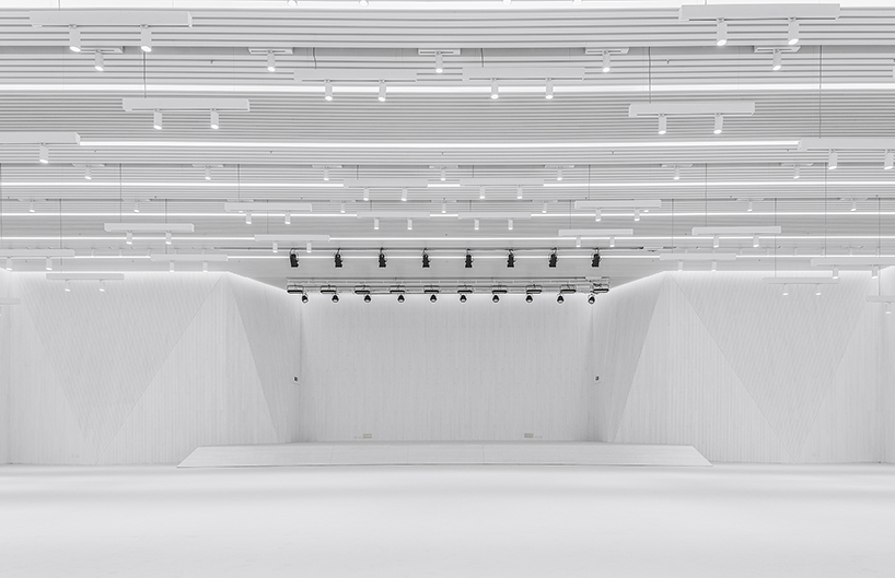 architecture school transforms old museum into a multifunctional futuristic space in beijing